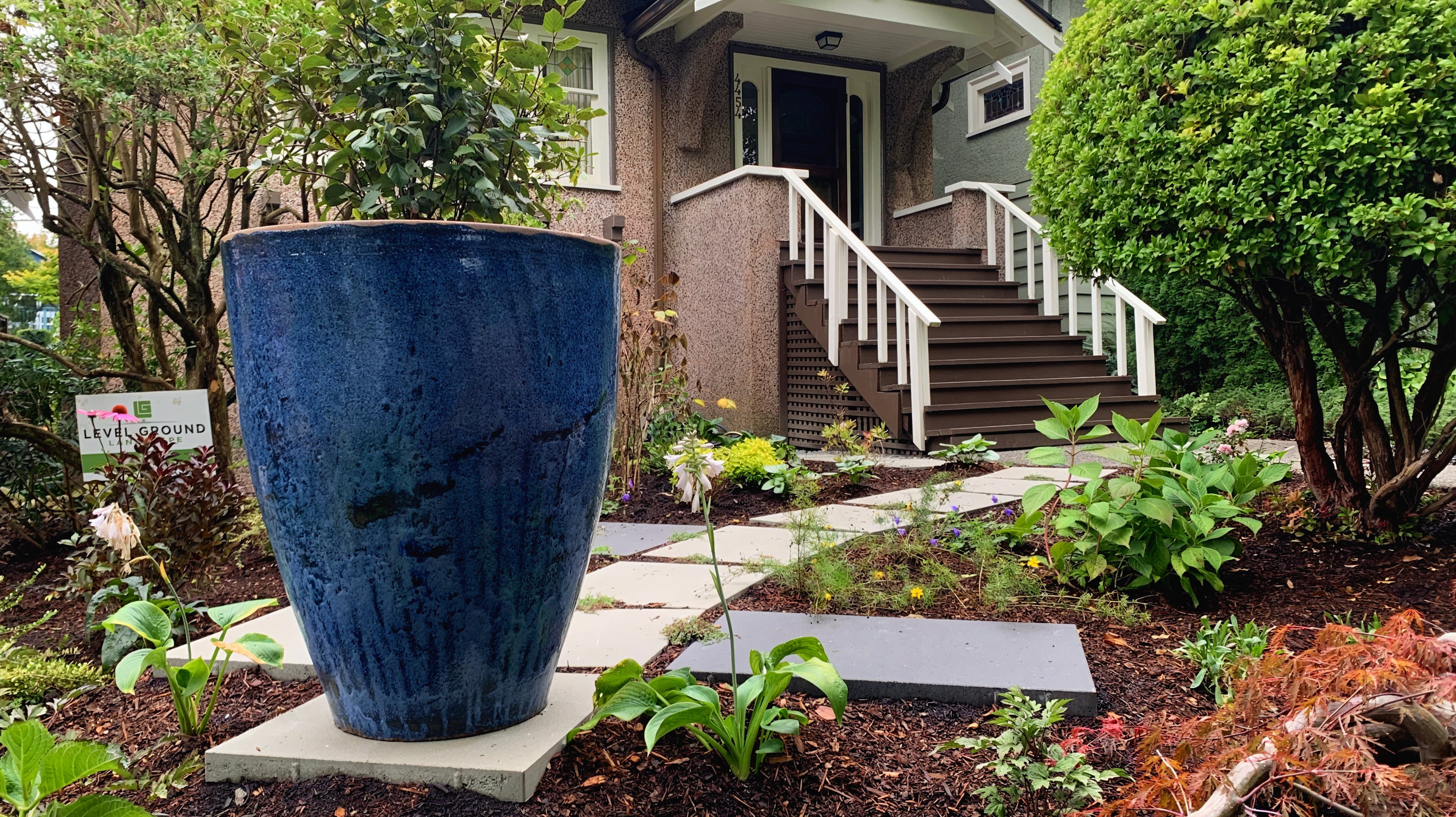 Custom design, Concrete slabs, Garden beds and Plants at the West 10th project.