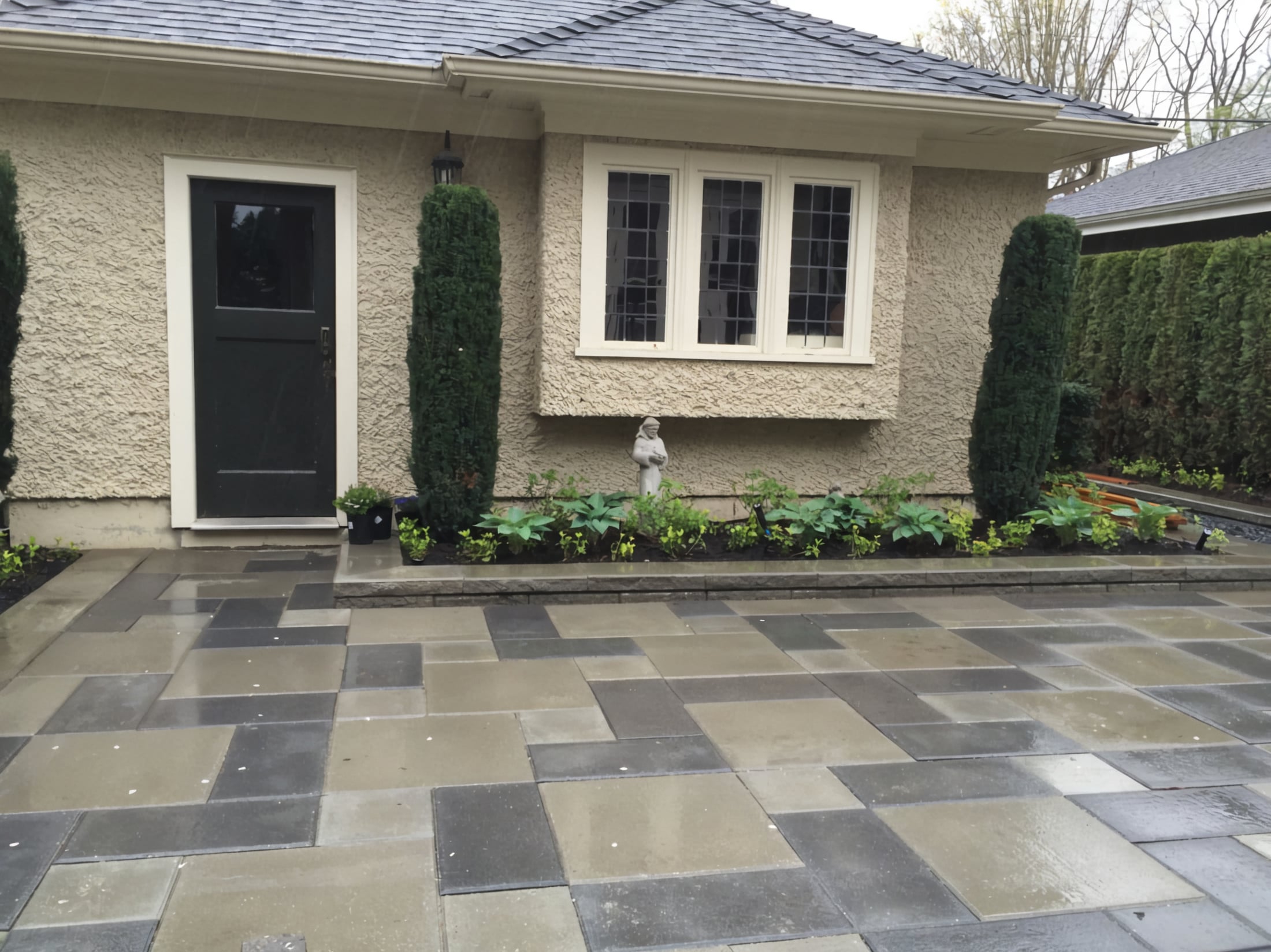Interlocking pavers, Retaining walls, Irrigation and Hedge trimming at the West 31st project.