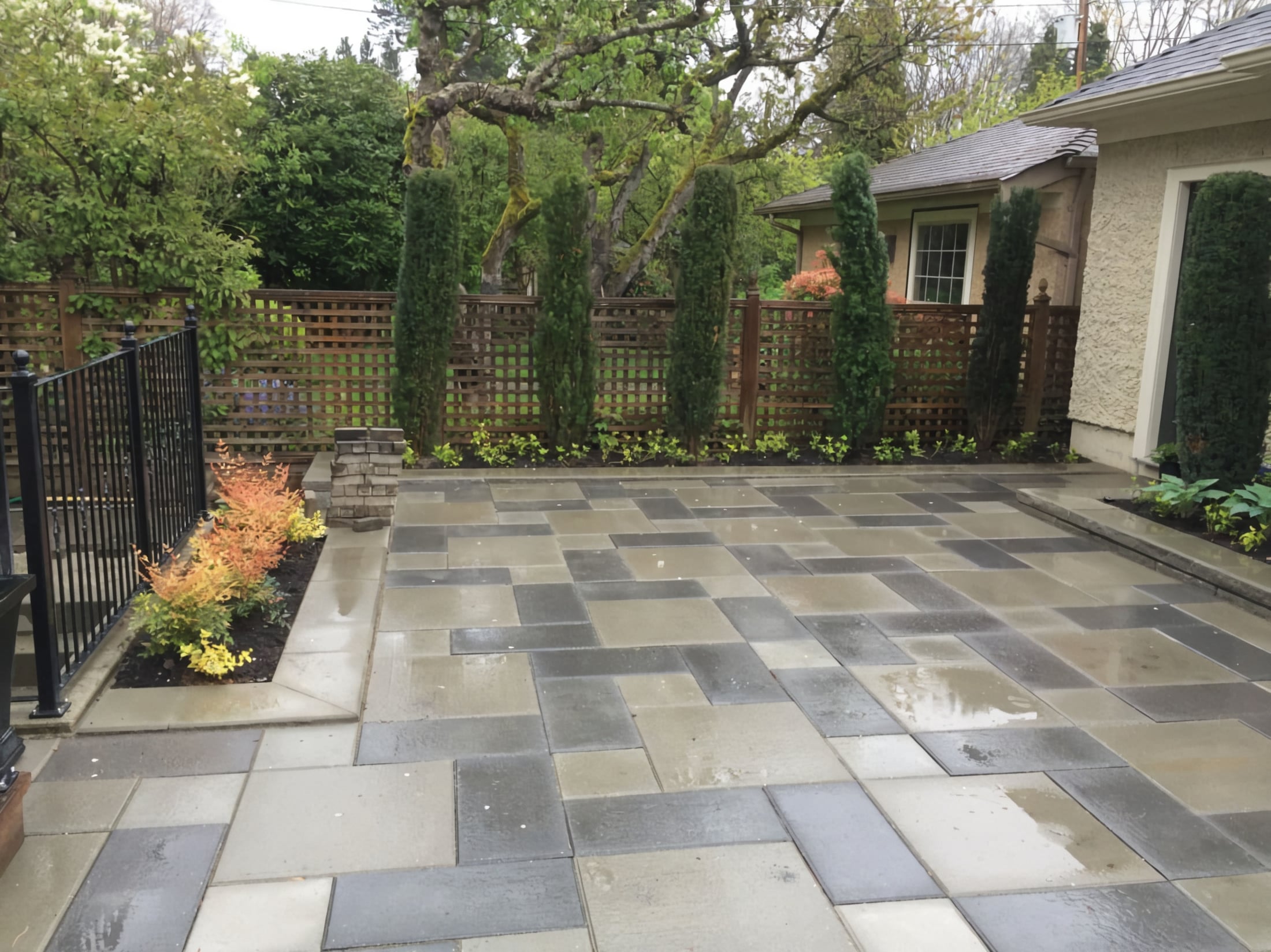 Interlocking pavers, Retaining walls, Irrigation and Hedge trimming at the West 31st project.
