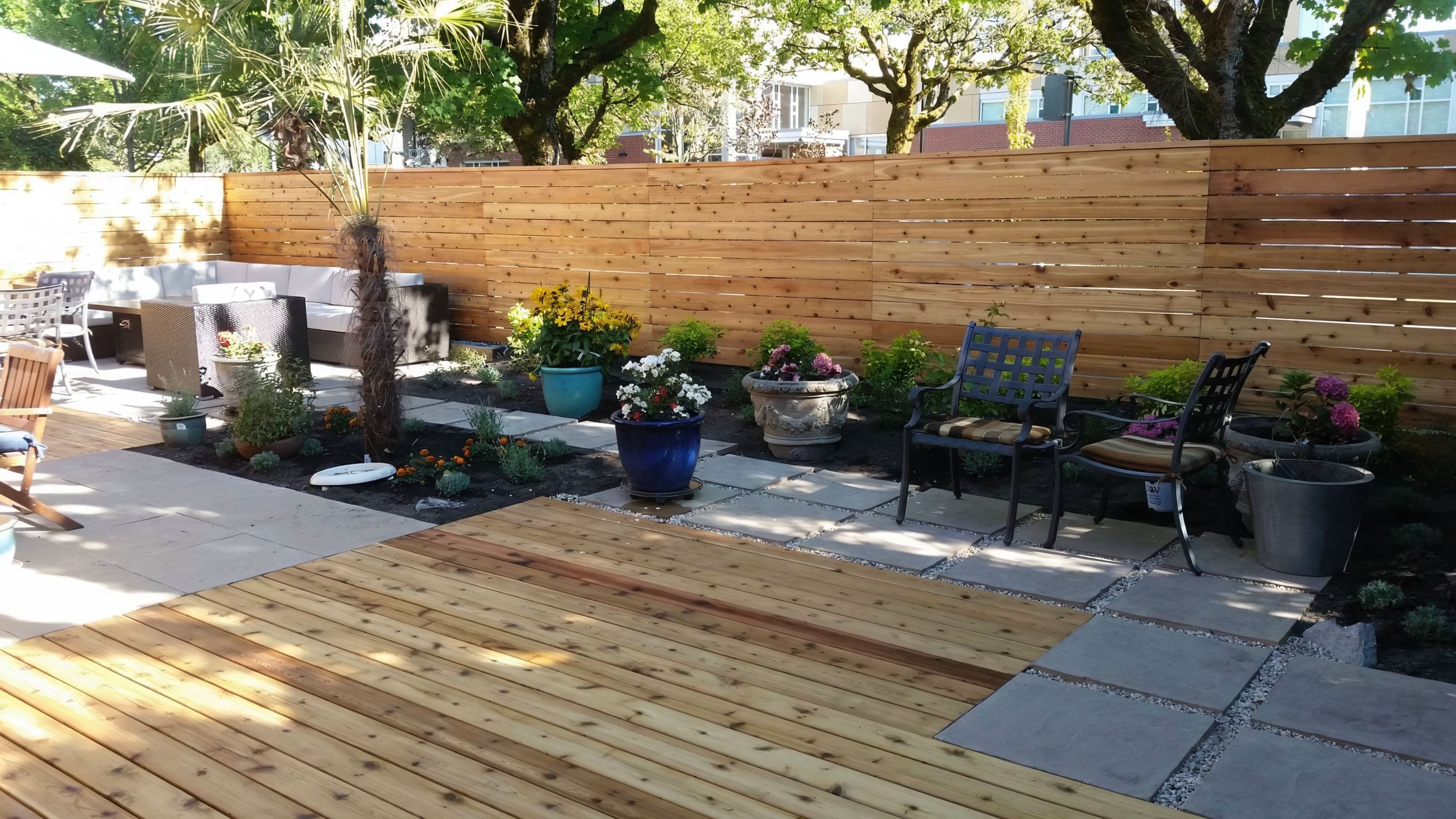Cedar fencing, Cedar patio, Concrete slabs and Trees at the West 6th project.
