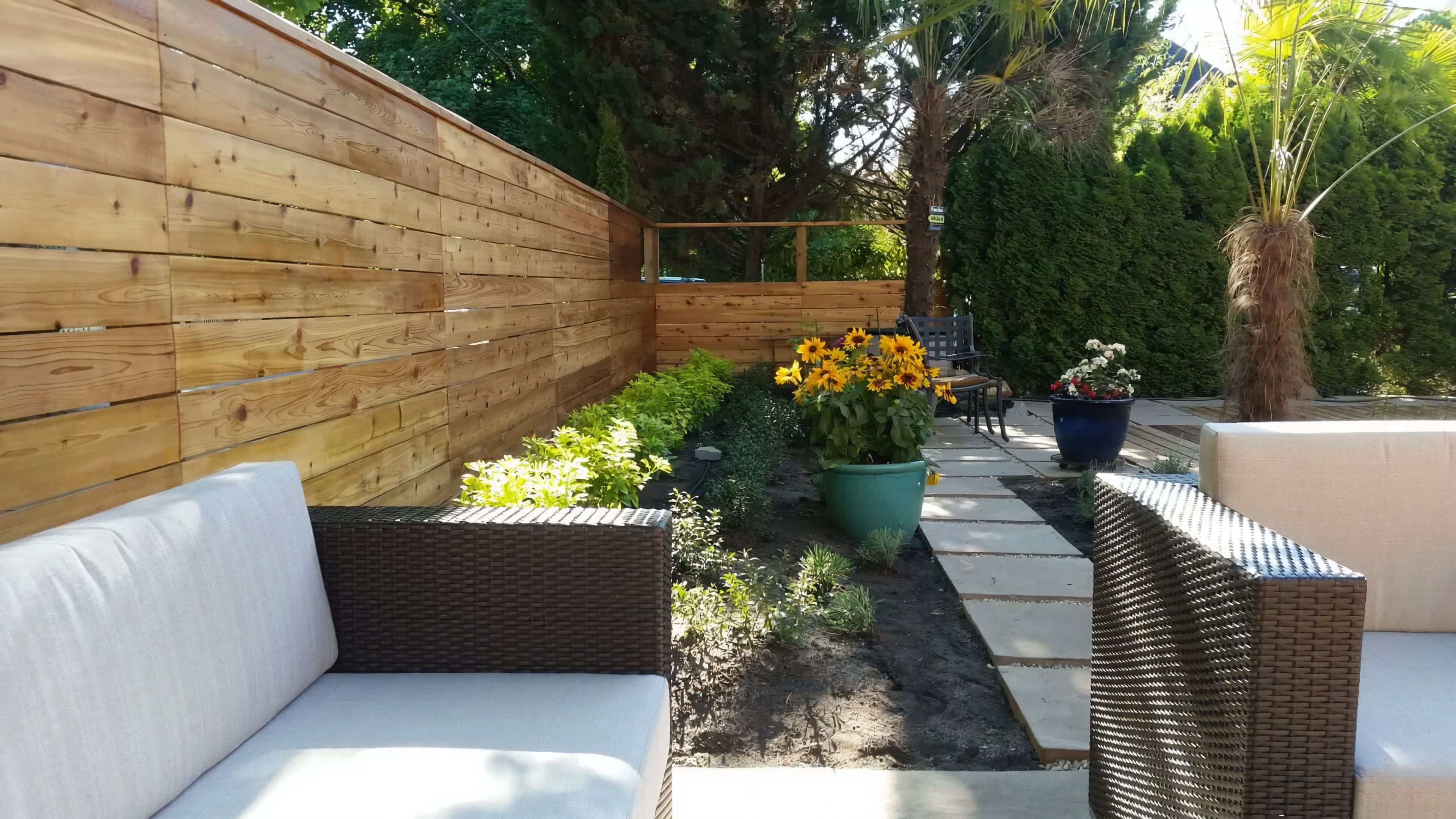 Cedar fencing, Cedar patio, Concrete slabs and Trees at the West 6th project.