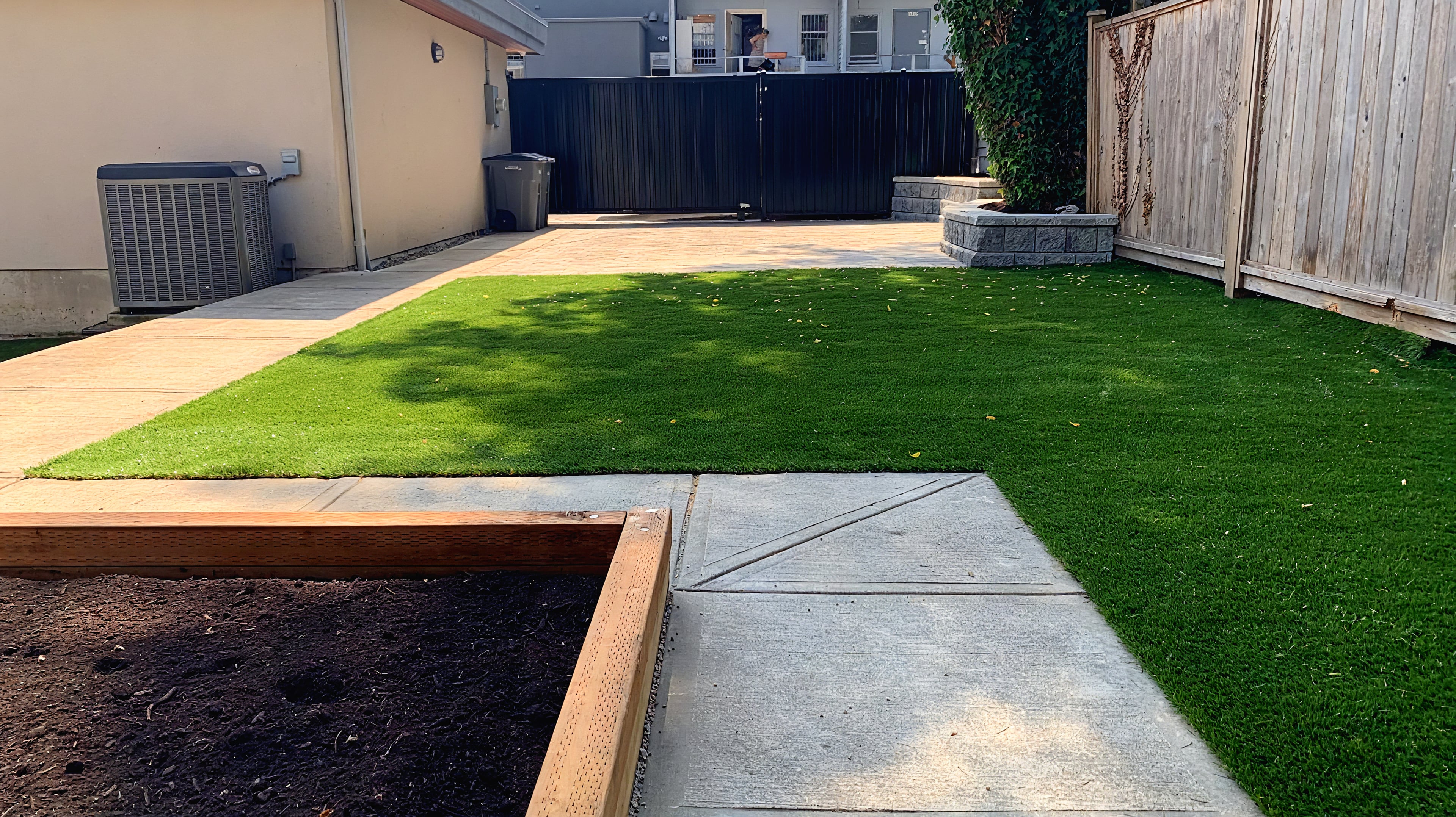 Artificial turf, Garden boxes, Interlocking pavers and Retaining walls at the West 9th project.