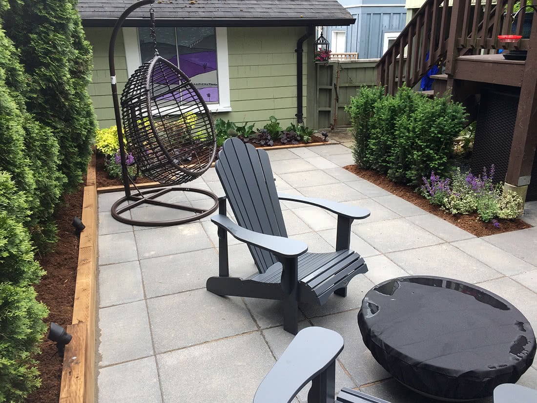 Residential landscaping patio installation - seating area with fire-it